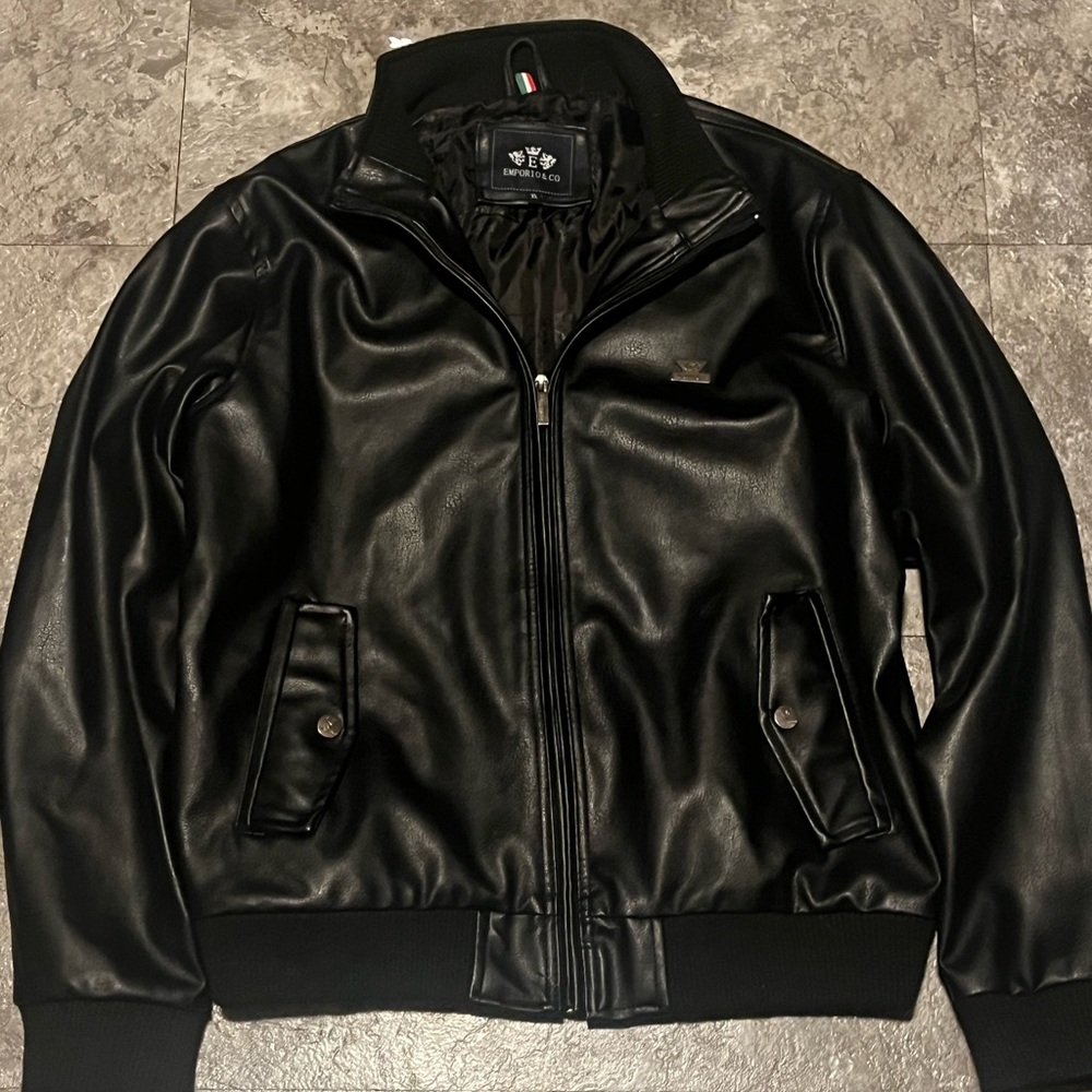 Very vintage emporia Armani jacket fits great size XL but feels like a Large